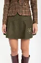 falda-de-lana-verde-con-escudo (1).webp
